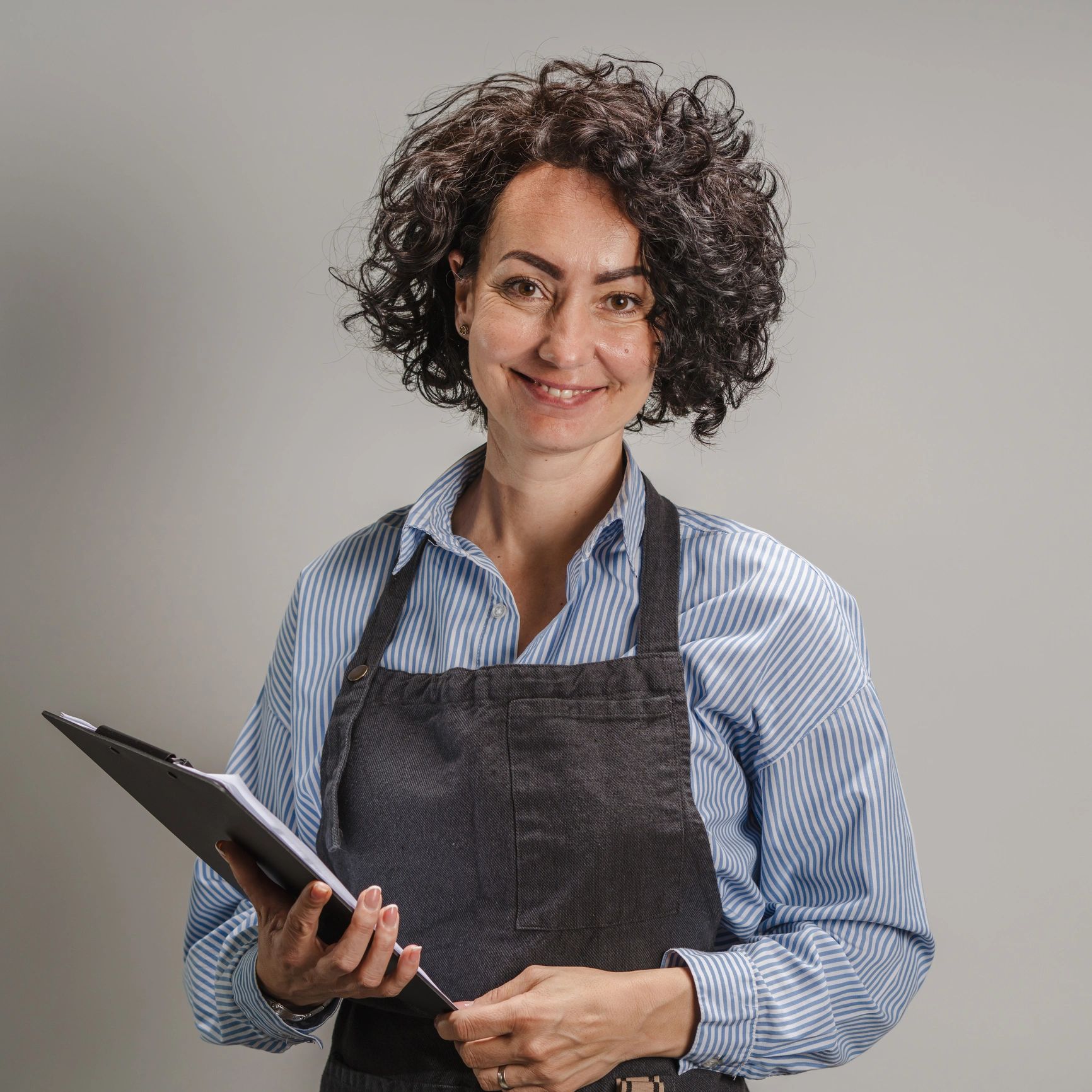 Restaurant team member portrait in apron