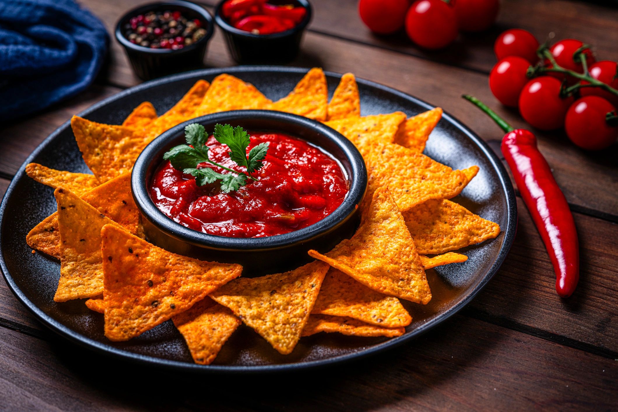 Chips and salsa on a rustic table